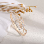 Ladies bracelet with elaborate infinity symbol and sparkling zirconia Symbol Fashion