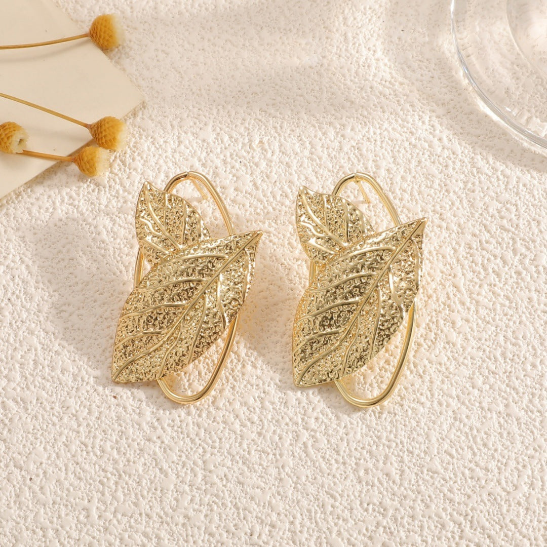 Women’s bracelet with elaborate leaf design Symbol Fashion