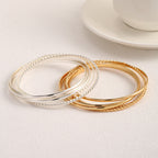 Women's bangle set with elaborate, braided and simple designs Symbol Fashion