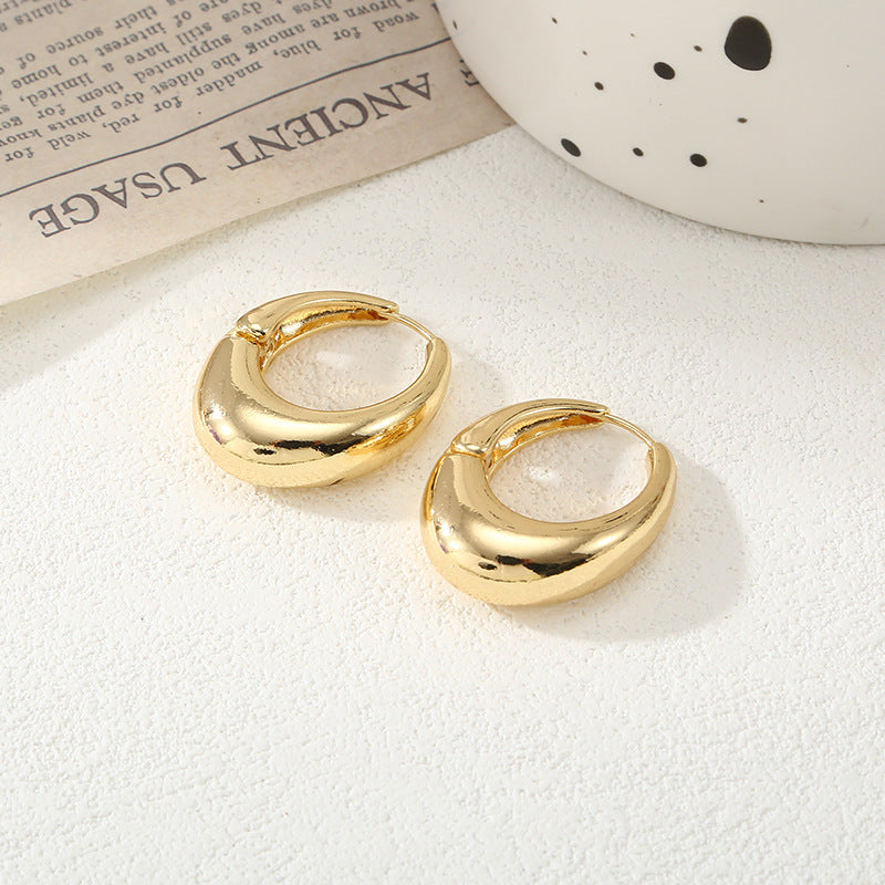 Women's Hoop Earrings with Elegant Curved Design Symbol Fashion