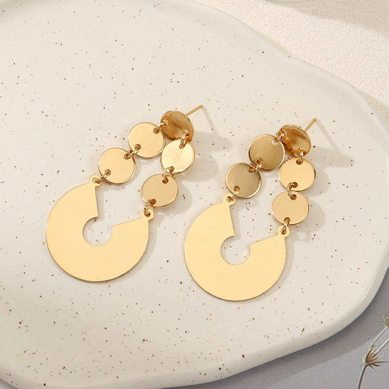 Women's elegant earrings with rustic, folded design Symbol Fashion