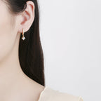 Ladies earrings with sparkling crystals and high-quality gold plating Symbol Fashion