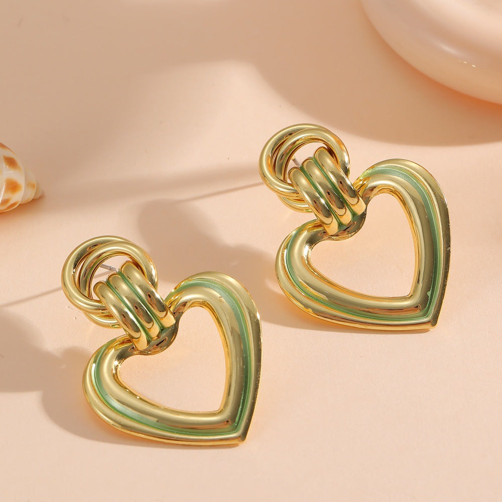 Women’s earrings in modern heart design Symbol Fashion
