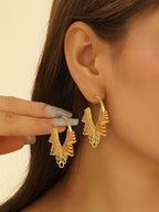 Women artistically designed hoops Symbol Fashion