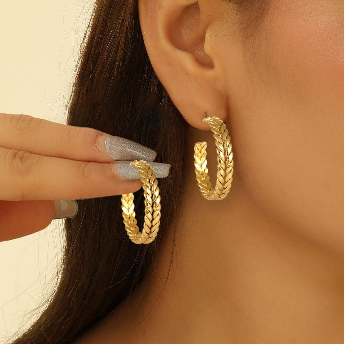 Women artistically designed hoops Symbol Fashion