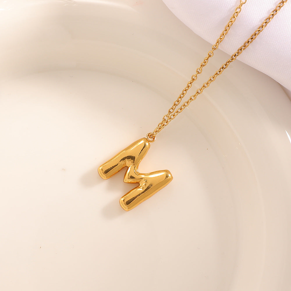 Women's necklace with curved letter pendant Symbol Fashion