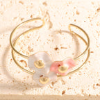 Women's bangle with elaborate floral design Symbol Fashion
