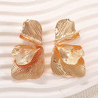 Women's ear clips in an elegant, textured design Symbol Fashion