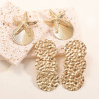 Women's ear clips in luxurious shell and starfish design Symbol Fashion