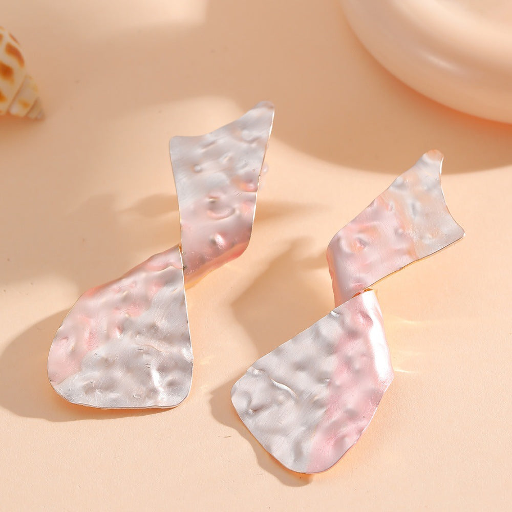 Ladies earrings in modern disc design Symbol Fashion