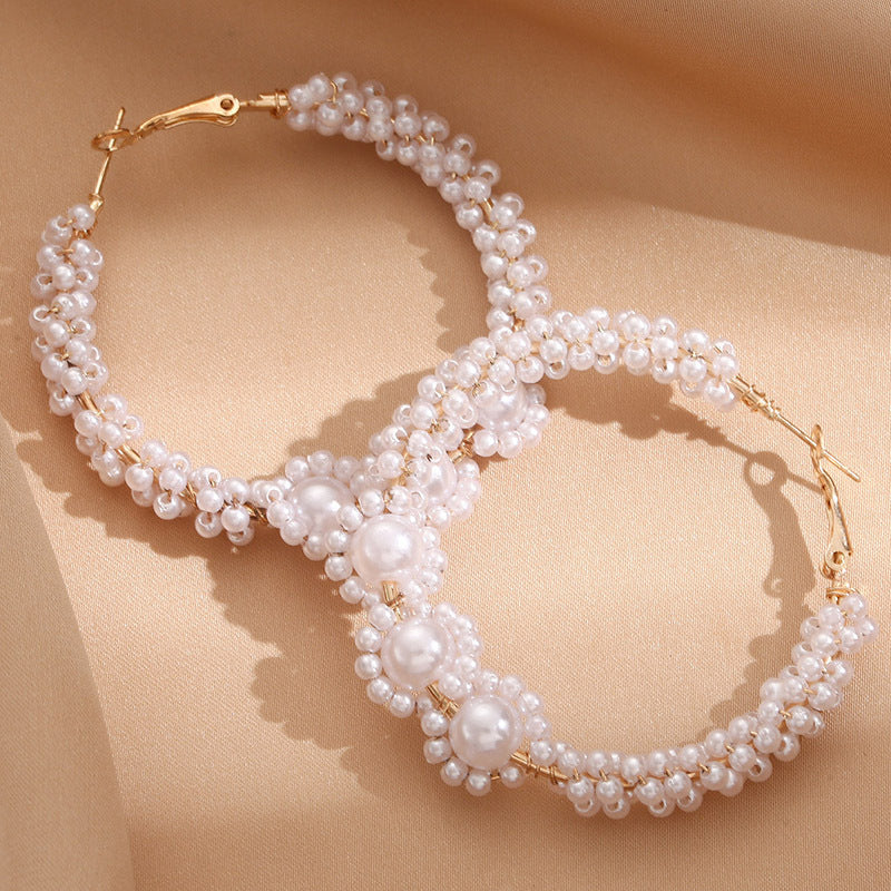 Women’s hoops with artistic pearl design Symbol Fashion