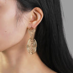 Women's Hanging Earrings in Artful Wire Design Symbol Fashion