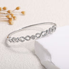 Ladies bracelet with elaborate infinity symbol and sparkling zirconia Symbol Fashion