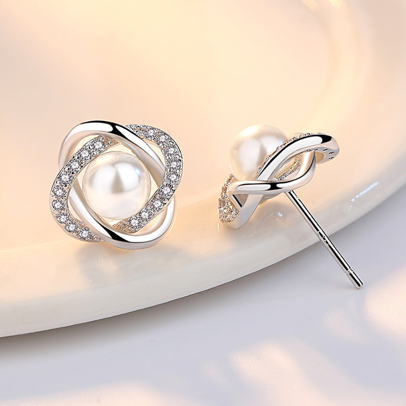 Ladies earrings with artistic pearl design and sparkling zirconia Symbol Fashion