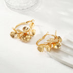 Ladies Creoles with artistic floral ornament Symbol Fashion