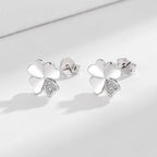 Ladies earrings in modern floral design Symbol Fashion