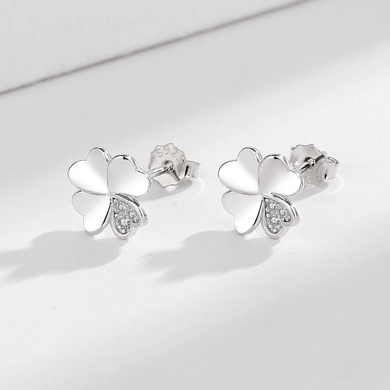Ladies earrings in modern floral design Symbol Fashion