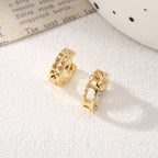 Women's hoop earrings with modern, textured design Symbol Fashion