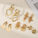 Women's elegant earrings with rustic, folded design Symbol Fashion