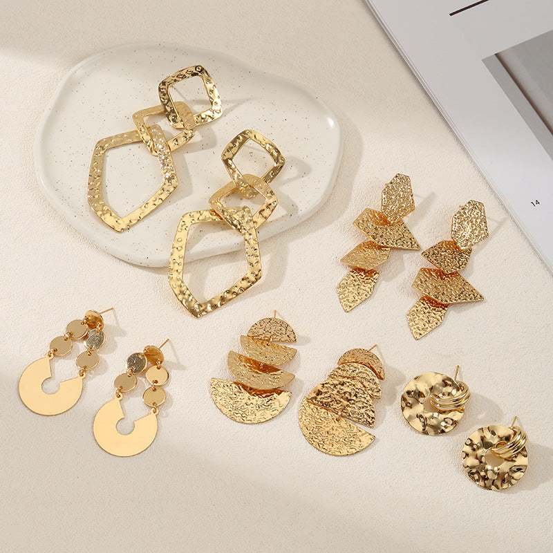 Women's elegant earrings with rustic, folded design Symbol Fashion