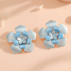 Ladies' flower earrings with intricate design and glossy accents Symbol Fashion