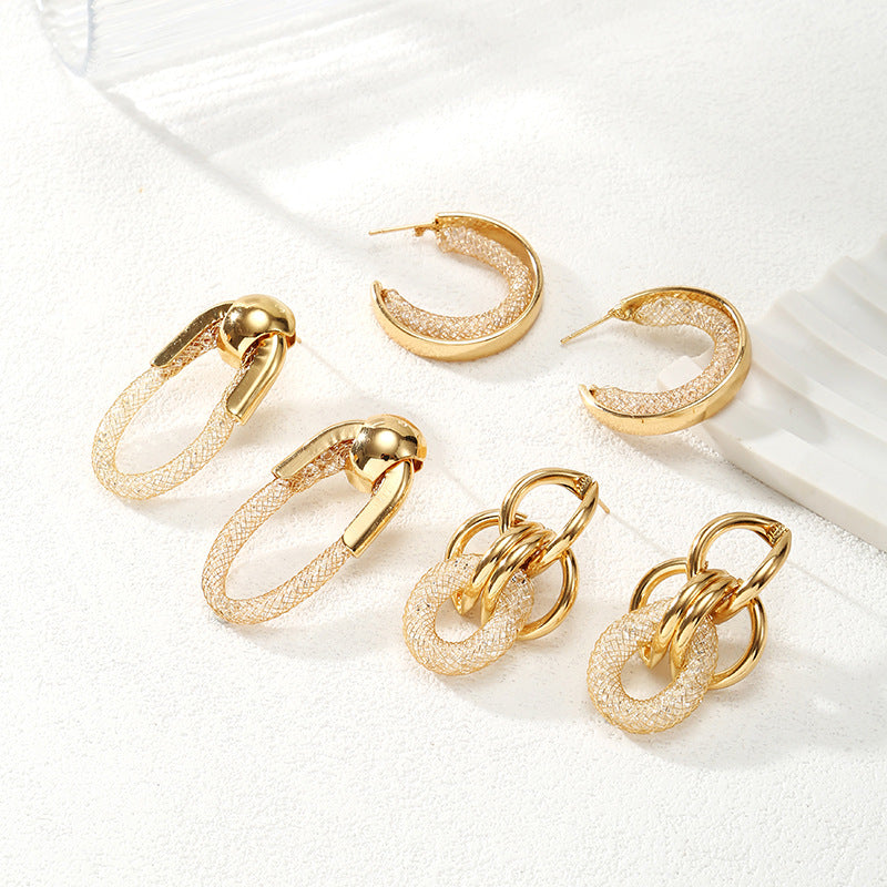 Ladies Hanging Earrings with Innovative, Gold-colored Design Symbol Fashion