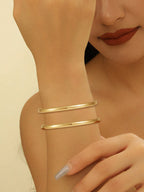 Ladies' bangle with elegant curved design Symbol Fashion