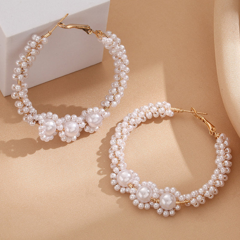 Women’s hoops with artistic pearl design Symbol Fashion