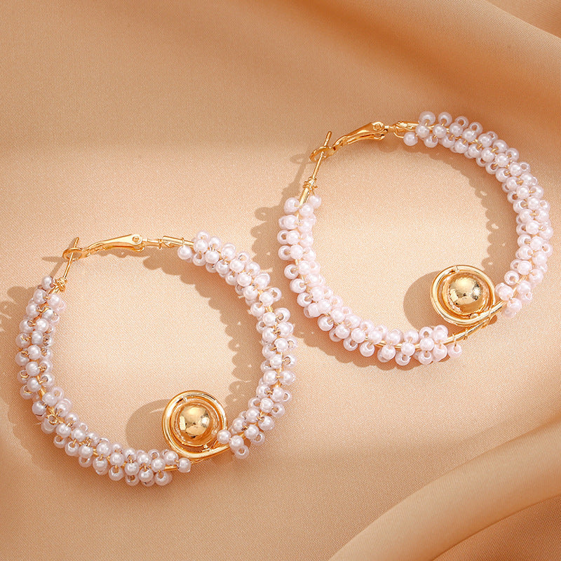 Women’s hoops with artistic pearl design Symbol Fashion