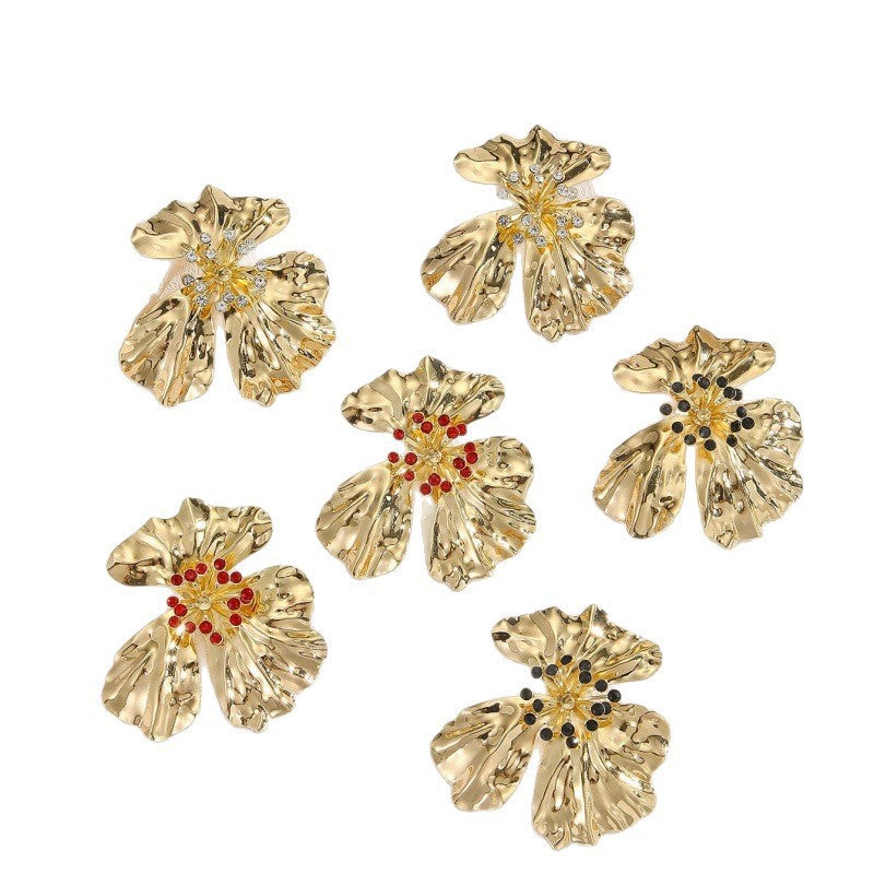 Women’s metal flower earrings with sparkling red accents Symbol Fashion
