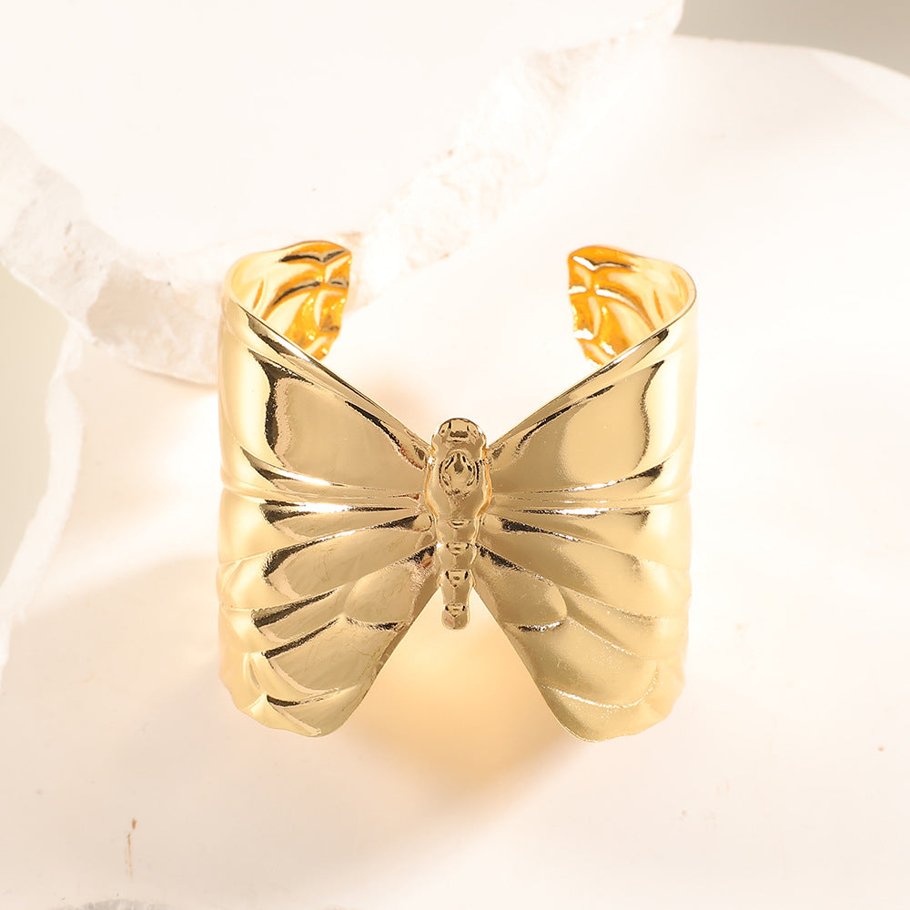 Women Open Bangle with Artistic Relief Design Symbol Fashion