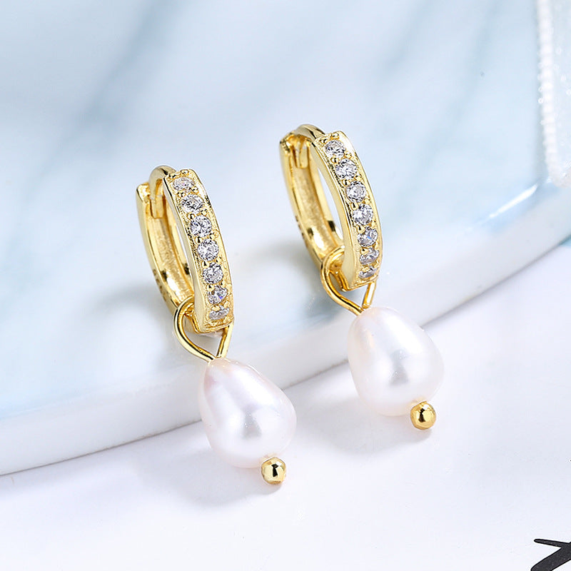 Ladies earrings with elegant zirconia decorations and pearl pendants Symbol Fashion