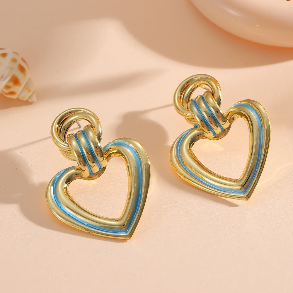 Women’s earrings in modern heart design Symbol Fashion