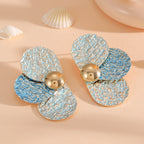Women's ear clips in elaborate floral pattern Symbol Fashion
