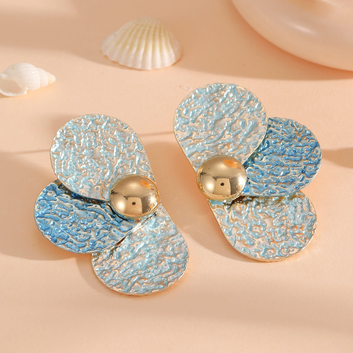 Women's ear clips in elaborate floral pattern Symbol Fashion