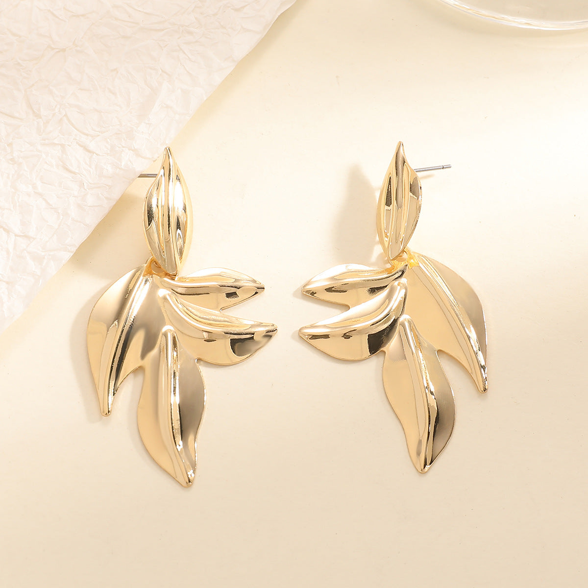 Women’s earrings with elegant leaf design Symbol Fashion