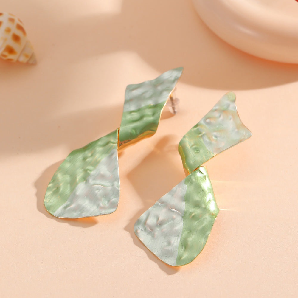 Ladies earrings in modern disc design Symbol Fashion
