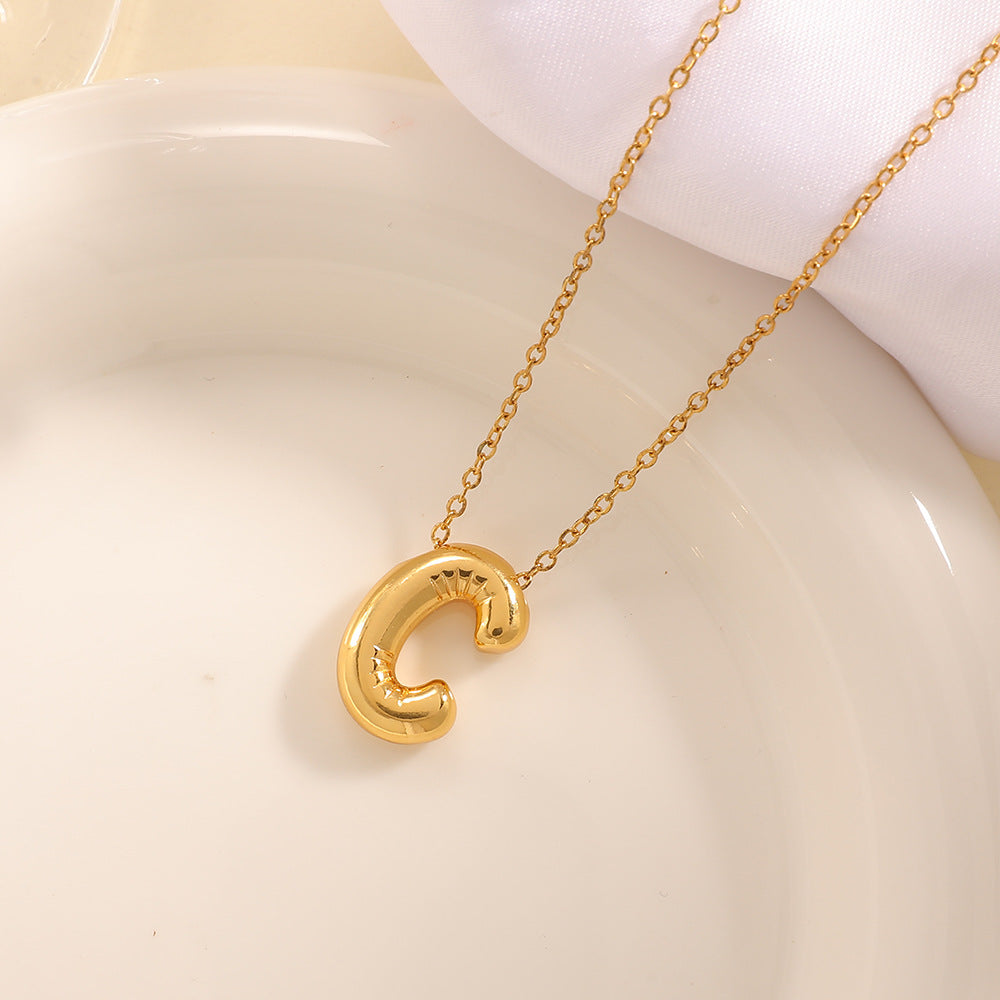 Women's necklace with curved letter pendant Symbol Fashion