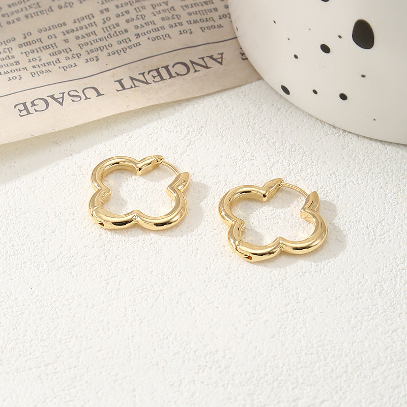 Ladies hoops in unique, sculptural design Symbol Fashion