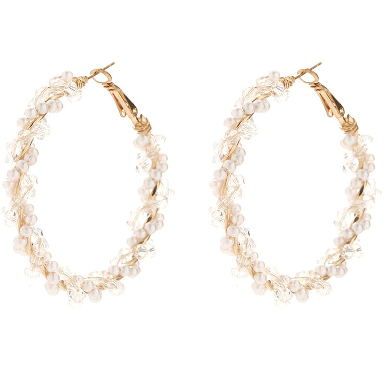 Ladies hoop earrings with luxurious pearl accents and elegant, twisted design Symbol Fashion