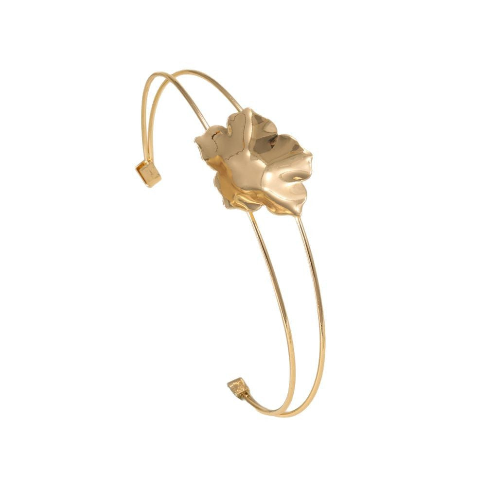 Women's cuff bracelet with artistic leaf motif Symbol Fashion