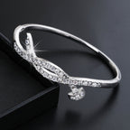 Ladies bracelet with elaborate infinity symbol and sparkling zirconia Symbol Fashion