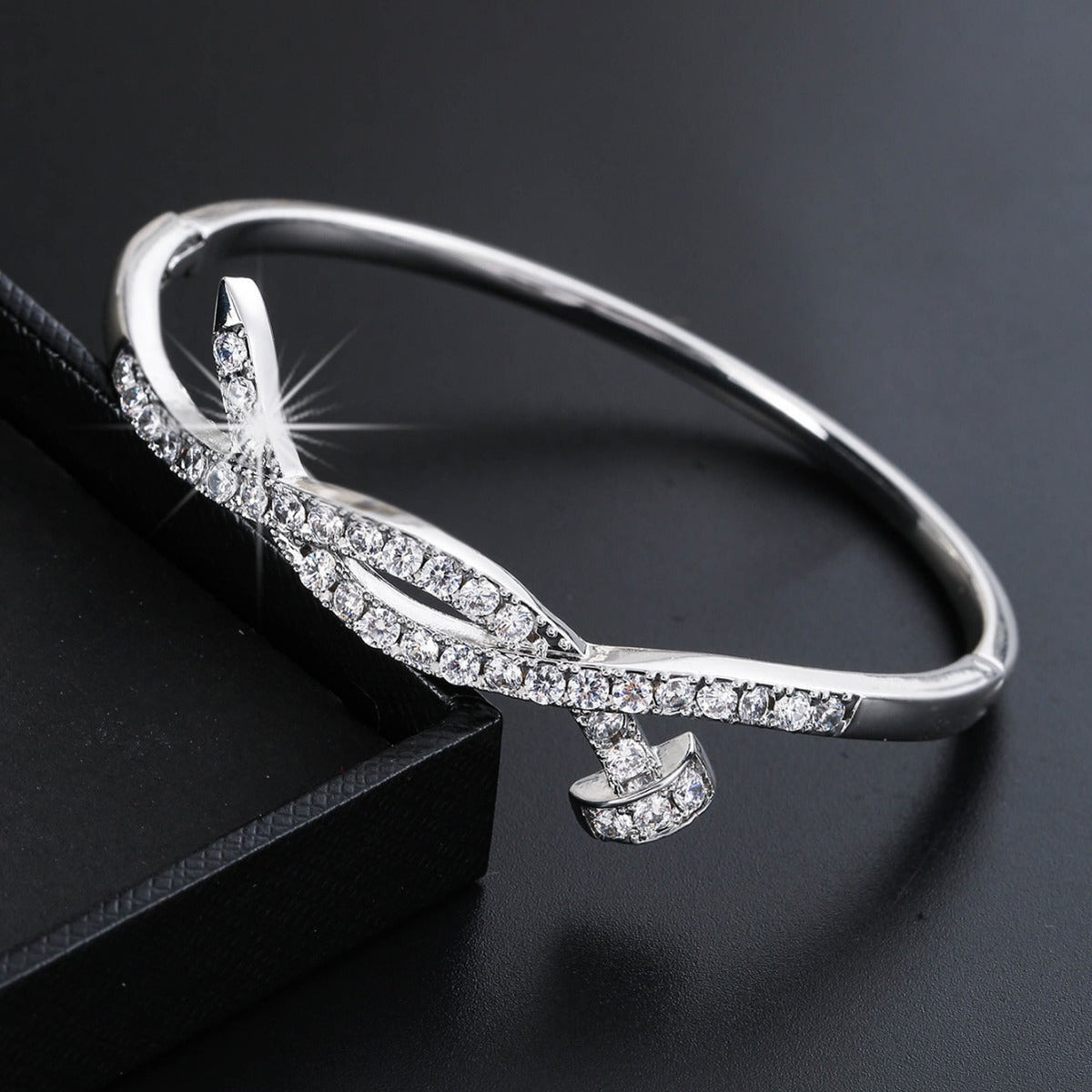 Ladies bracelet with elaborate infinity symbol and sparkling zirconia Symbol Fashion