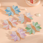 Women’s hair accessory with elaborate leaf design Symbol Fashion