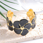 Ladies cuff bracelet with elaborate flower pattern Symbol Fashion
