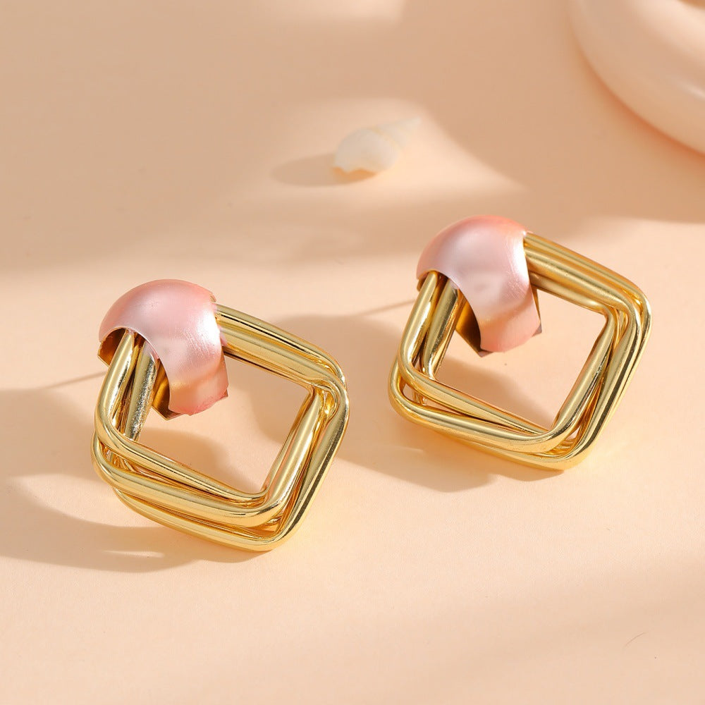 Women modern earrings with asymmetrical design Symbol Fashion