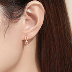 Ladies earrings with sparkling zirconia and modern design Symbol Fashion