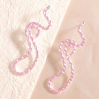 Ladies earrings in elegant wave pattern Symbol Fashion