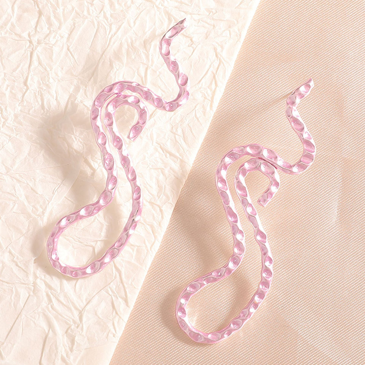 Ladies earrings in elegant wave pattern Symbol Fashion