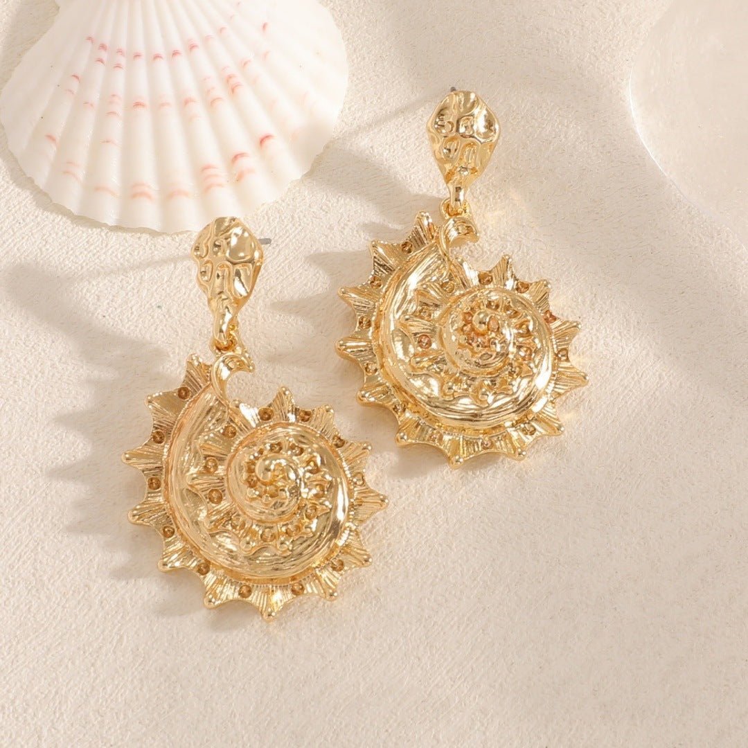Ladies earrings in shell design Symbol Fashion